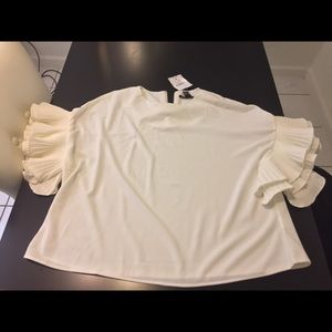 White blouse with bell sleeves